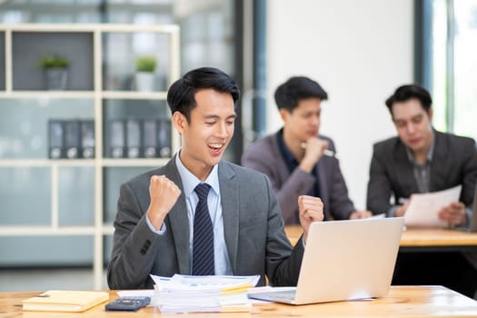 Young Professionals work in modern office, Businessman people working on computer, group of business people working together. High quality photo