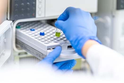 examination of a chemical sample using modern devices in the biochemical laboratory of the research institute. High quality photo