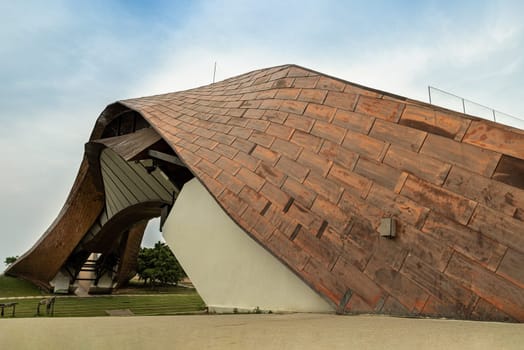 Nakhonsawan, Thailand - Apr 23, 2023 - The Exterior Design Art Architecture name is PA SAN or Pasan Wooden Bridge, The memorial building landmark architecture for the origin of Chao Phraya River at Pak Nam Pho Located at the cape of Yom Island The confluence of the Ping and Nan rivers. Selective focus.