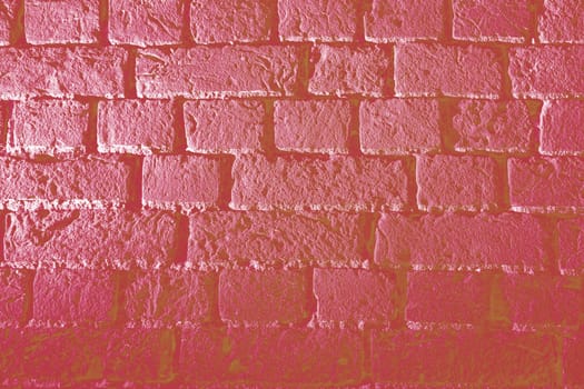 Background of ceramic tiles in new trendy color of 2023 Viva Magenta. Monochrome. Abstract.