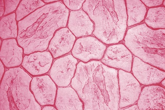 Background of ceramic tiles in new trendy color of 2023 Viva Magenta. Monochrome. Abstract.