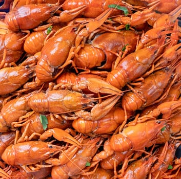 top view of cooked crawfish with lemons and spices, texture