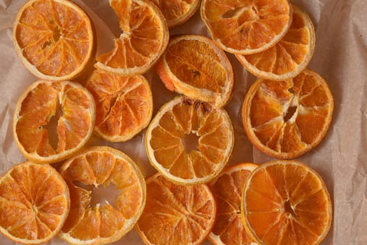 Pattern with dried orange slices, in natural light.