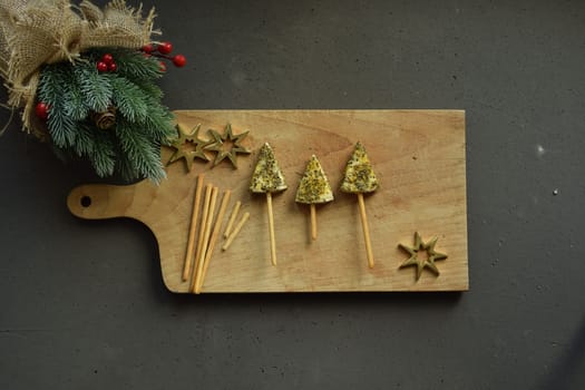 Cheese slices with oregano, festive meal.