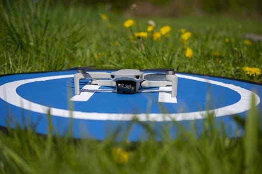 Unmanned aerial vehicle on the background of the take-off site. High quality photo