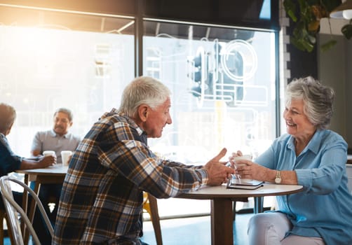 Good communication between two aging partners. a senior couple out on a date at a coffee shop