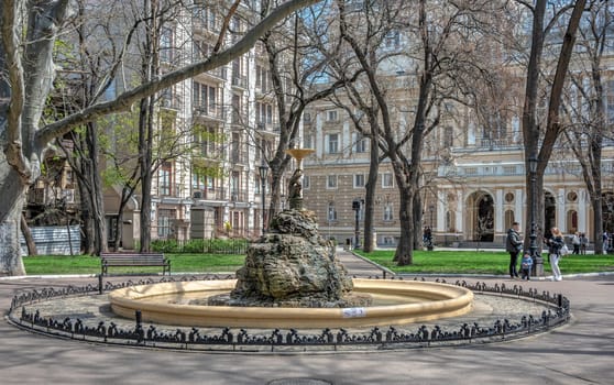 Odessa, Ukraine 15.04.2023. Fountain in the City square Palais Royal in Odessa, Ukraine, on a sunny spring day