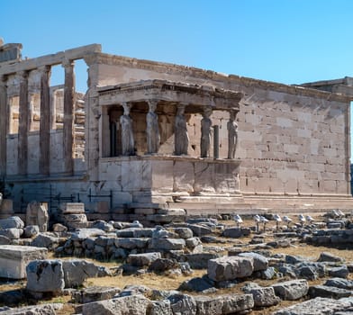 ATHENS, GREECE - 06/23/2013 - panoramic background with Acropolis, porch of caryatids, Erechtheum Temple in Athens, Greece