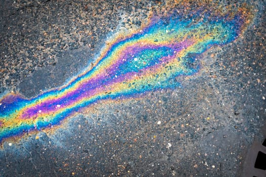 Waste from the oil industry flows down the storm drain with rainwater.