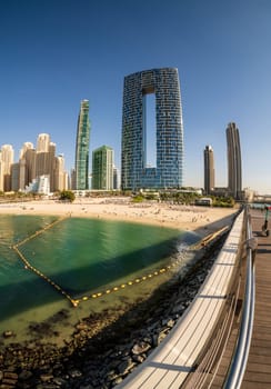Fisheye view of apartments and hotels on oceanfront in Jumeirah Beach Residence area of Dubai