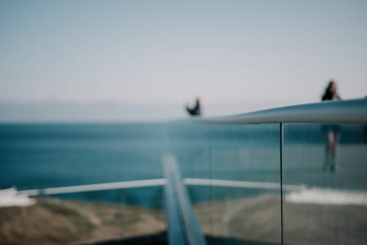 Panoramic view of the city. An observation deck with a figured fence and a lantern. City view.