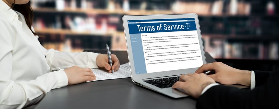 Online term of service conditions showing astute rules and regulations in using the website on a laptop computer screen for users to make an agreement