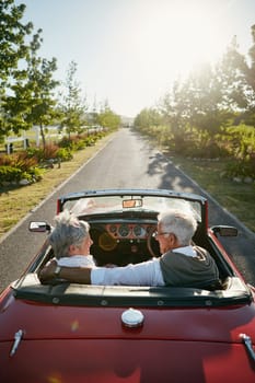 Retirement is a time to do whatever you want to. a senior couple going on a road trip