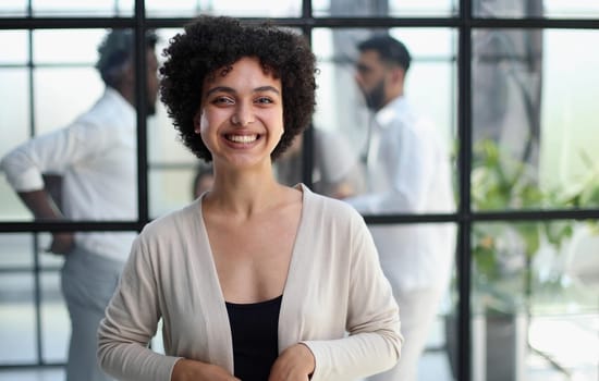 Portrait of a young business woman in an modern office