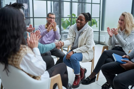 Different groups of people communicate with each other during business seminar or training.