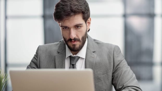 Successful businessman working inside office, man in business suit