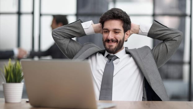 Young businessman your hands on the back of your head