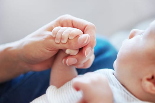 Always together. Closeup shot of a mother holding her newborn baby