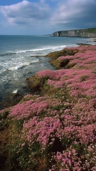 Shoreline covered in pink flowers by the sea. Generaitve AI