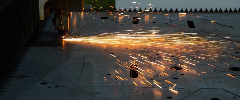CNC machine. Laser cutting of metal. Sparks