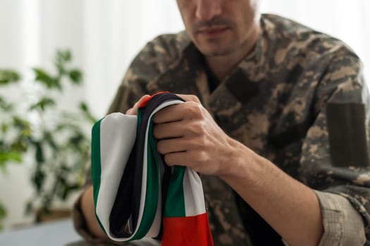 United Arab Emirates Soldier. Soldier with flag United Arab Emirates, United Arab Emirates flag on a military uniform. Camouflage clothing