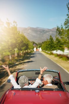 To live is to travel. a senior couple going on a road trip