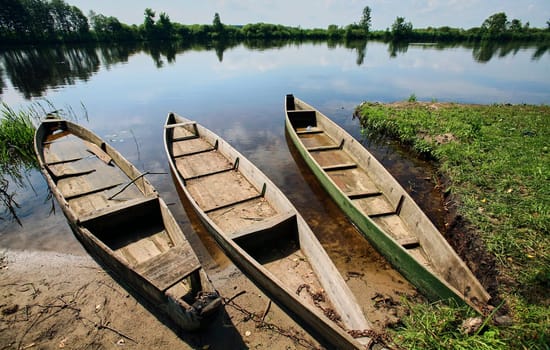 Eastern Europe, Republic of Belarus, Kachanovichi village, Pinsk district, Brest region. River and boats in the summer season.