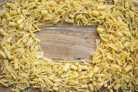 assortment of uncooked pasta arranged on part of the frame