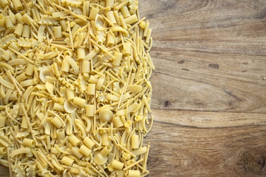 assortment of uncooked pasta arranged on part of the frame