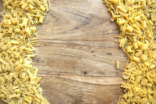 assortment of uncooked pasta arranged on part of the frame