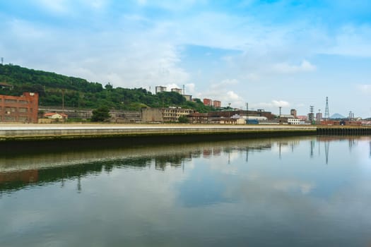 Abandoned industrial buildings along the Nervion River, Bilbao Basque Country, Spain