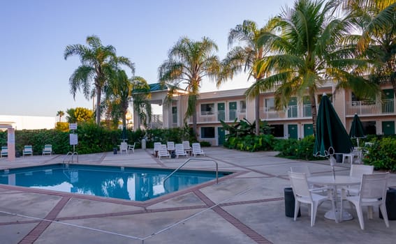 USA, FLORIDA - NOVEMBER 30, 2011: pool with clear water on the territory of the hotel courtyard, Florida