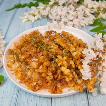 Acacia flowers fritters, Blossoming acacia with leafs, , Robinia pseudoacacia, White acacia, High quality photo