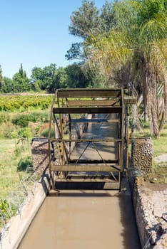 An irrigation canal and working waterwheel replica in Keimoes in the Northern Cape Province