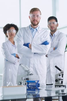 Scientists smiling together in lab