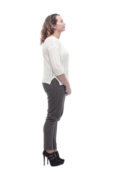 in full growth. attractive young woman in a white jumper. isolated on a white background.