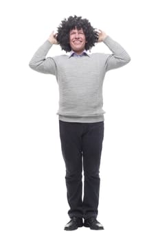 in full growth. amusing a man in a wig. isolated on a white background.