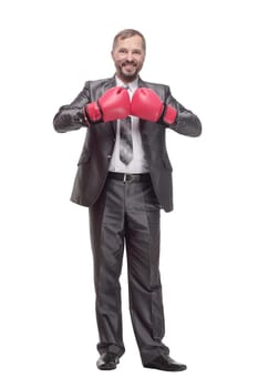 full-length. business man in Boxing gloves. isolated on a white background.