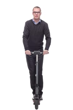 Full length portrait of a cheerful cool man with a scooter gesturing ok with his hand isolated on white background