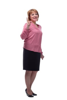 Portrait of a happy senior woman pointing upwards, isolated on a white background. Concept of finding new idea