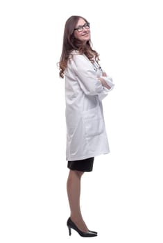 side view. friendly doctor looking at the camera . isolated on a white background.