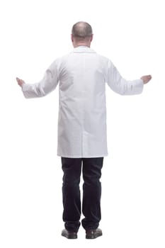in full growth. qualified mature doctor in a white coat .isolated on a white background.