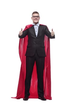 in full growth. young businessman in a superhero Cape. isolated on a white background.