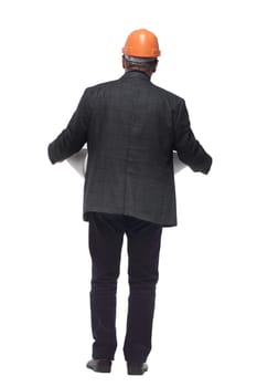 rear view. the architect is a professional reading the drawing. isolated on a white background