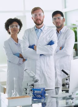 Scientists smiling together in lab