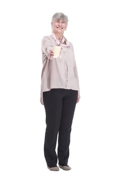 full-length.casual elderly woman with coffee to take away . isolated on a white background.