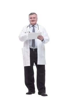 in full growth.competent doctor with clipboard. isolated on a white background.