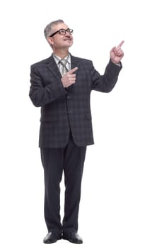 in full growth. smiling adult male pointing in the direction. isolated on a white background