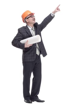 side view. smiling architect pointing somewhere up. isolated on a white background