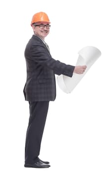 in full growth. a qualified architect holds a new drawing. isolated on a white background